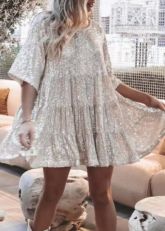 Woman wearing sequin oversized mini dress