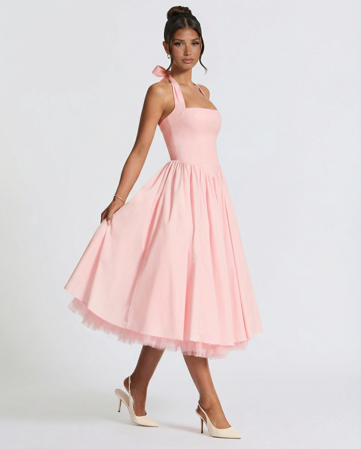 Woman wearing elegant white midi dress