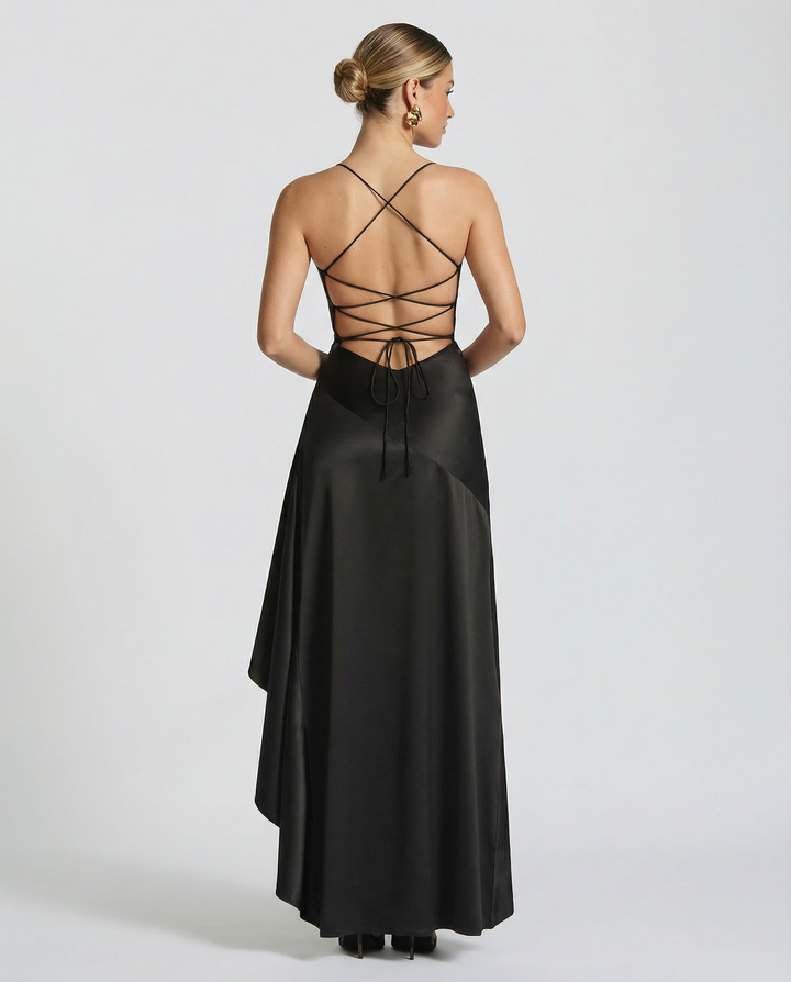Woman wearing satin high low maxi dress