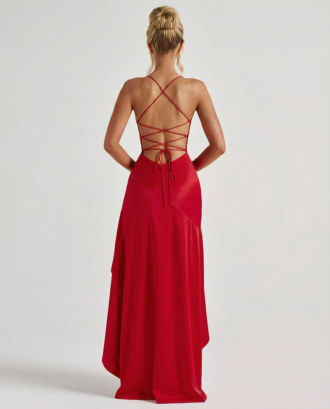 Woman wearing satin high low maxi dress