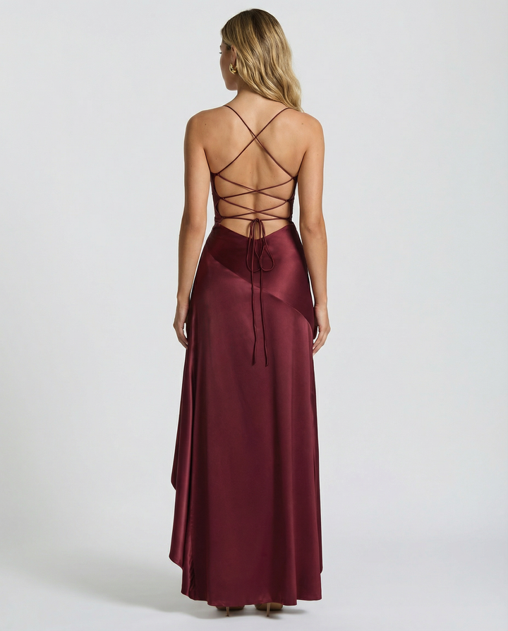 Woman wearing satin high low maxi dress