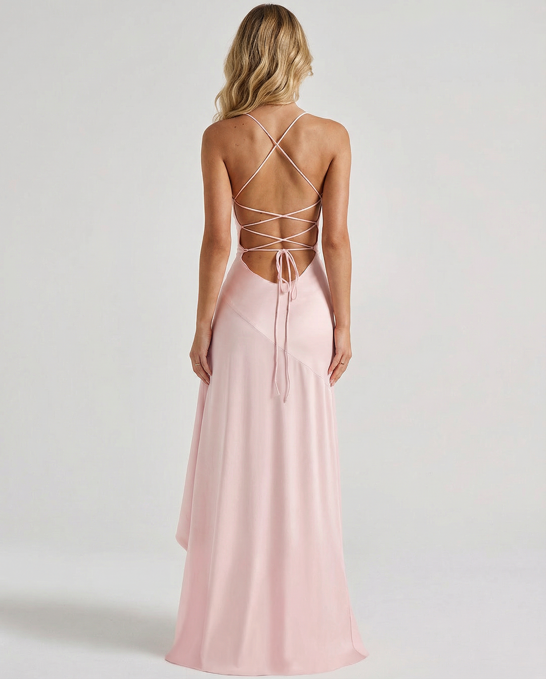 Woman wearing satin high low maxi dress