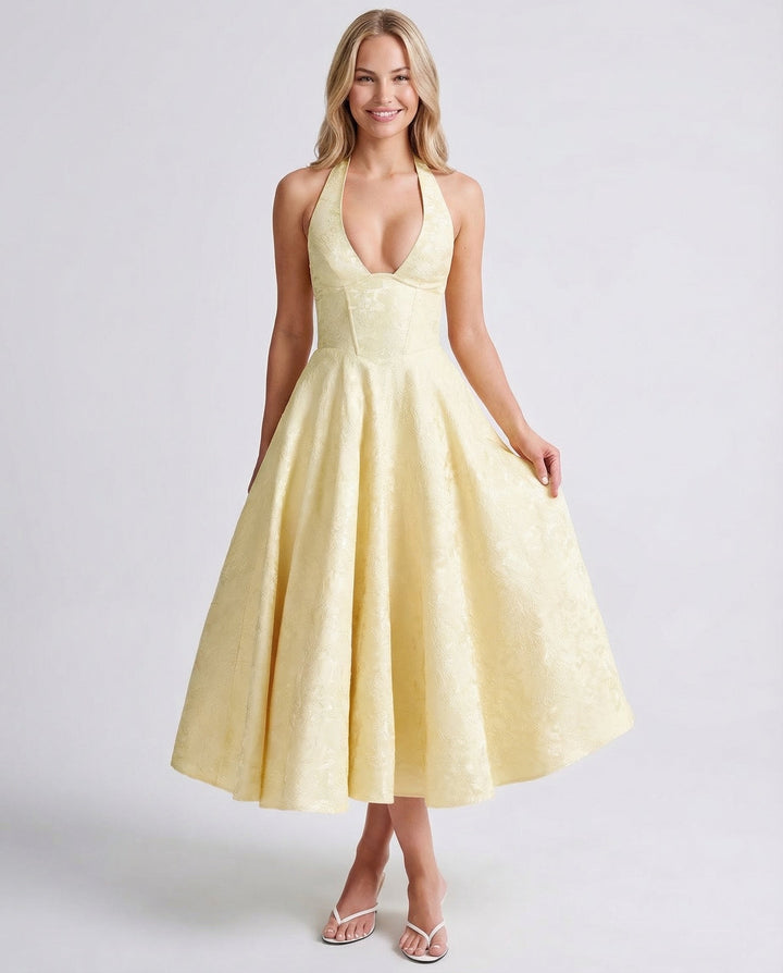 Woman wearing vintage halter midi dress
