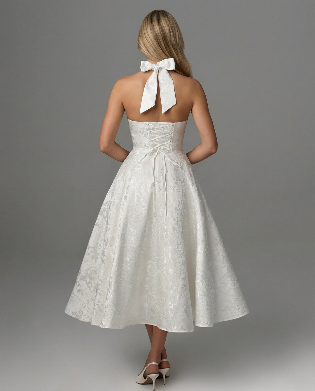 Woman wearing vintage halter midi dress