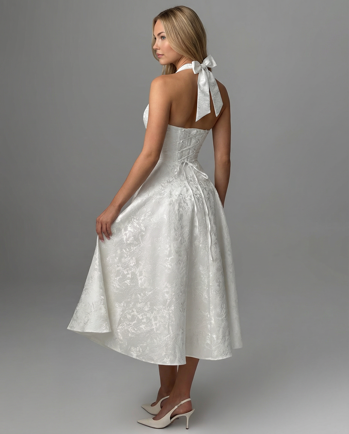 Woman wearing vintage halter midi dress
