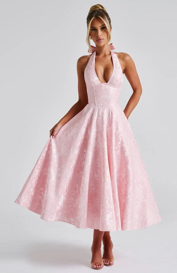Woman wearing vintage halter midi dress