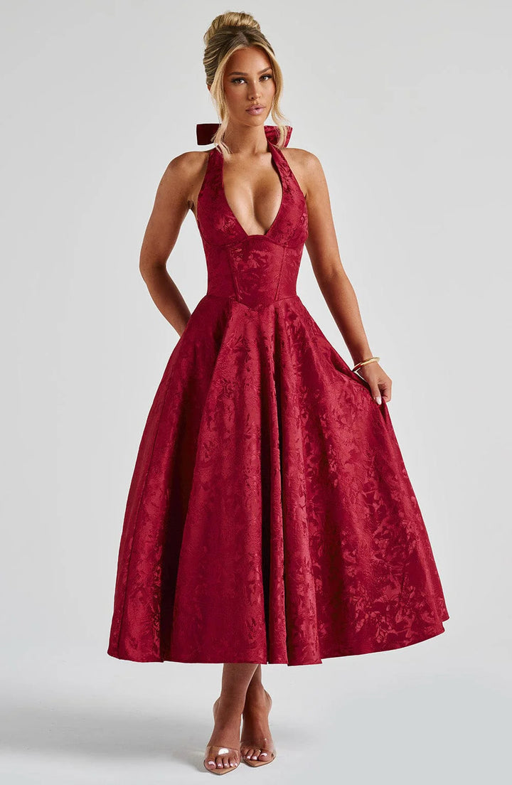 Woman wearing vintage halter midi dress