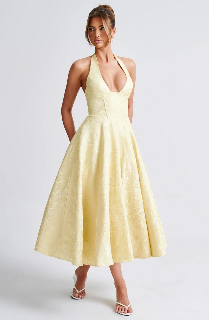 Woman wearing vintage halter midi dress