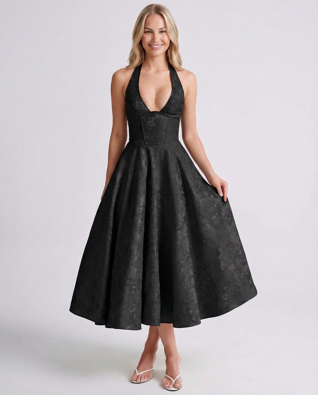 Woman wearing vintage halter midi dress