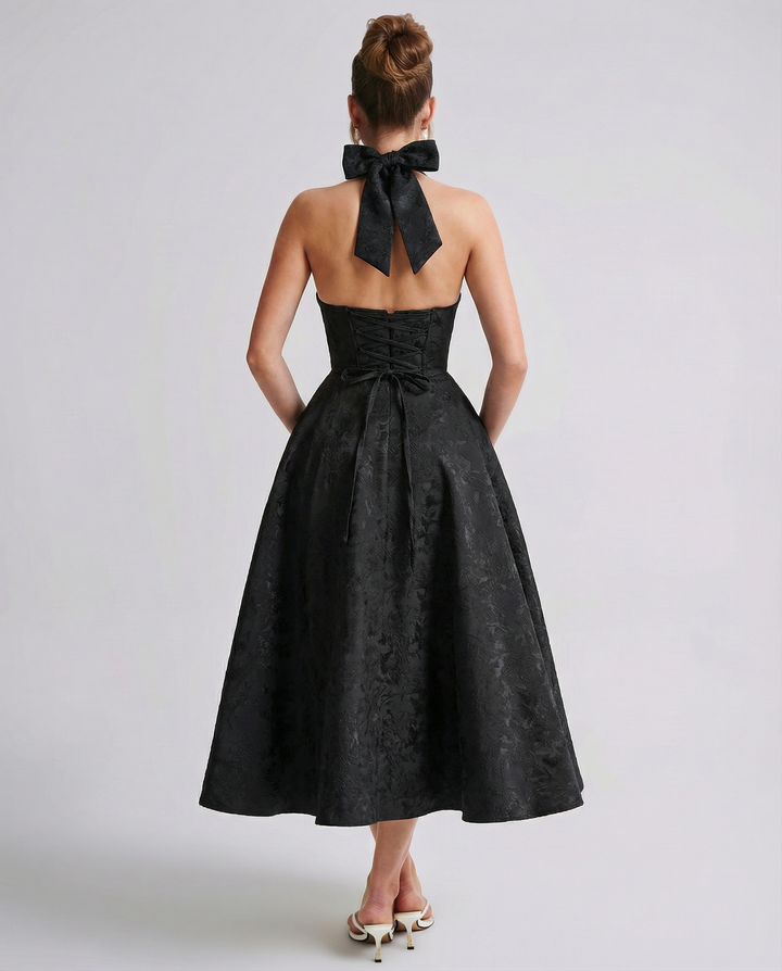 Woman wearing vintage halter midi dress