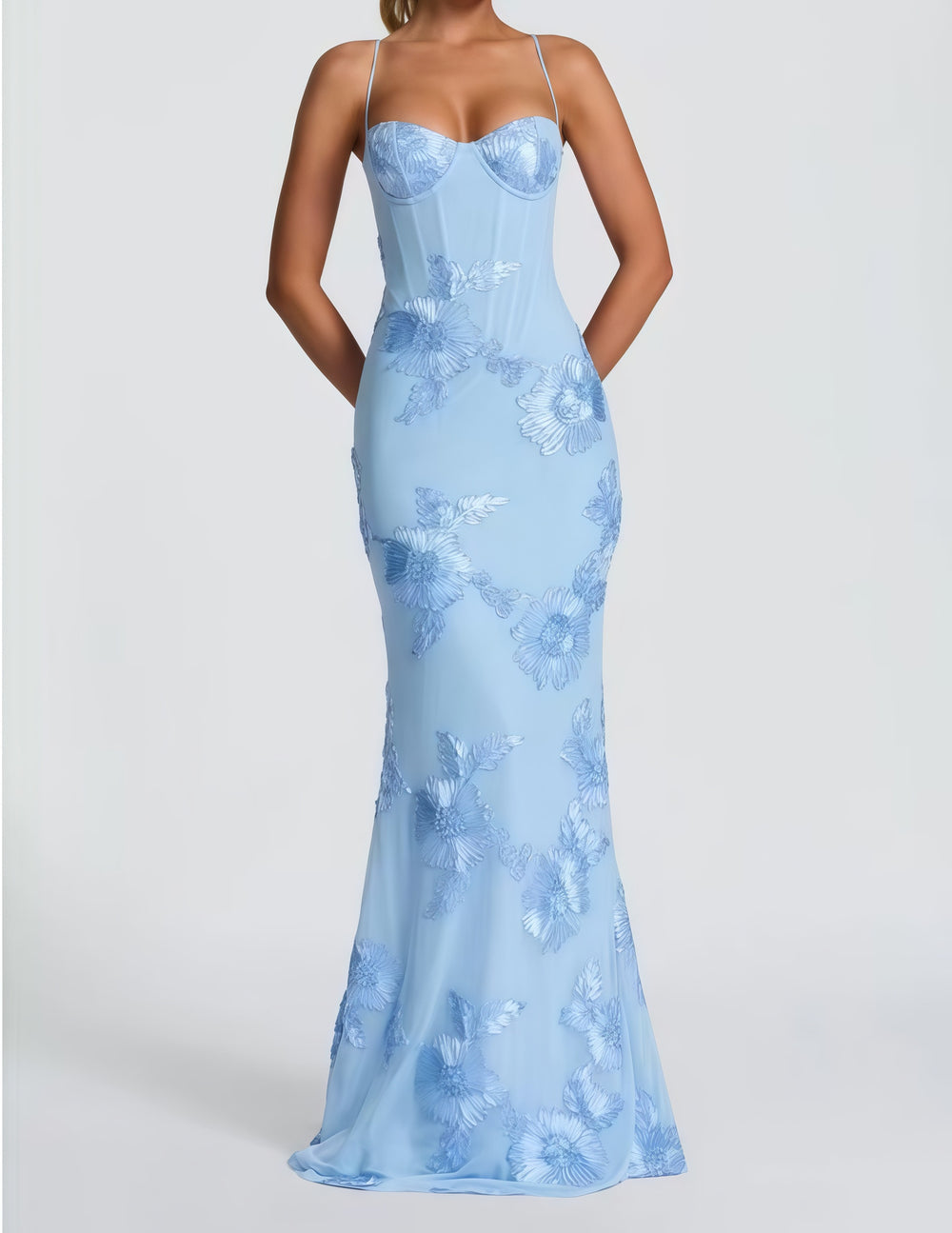 Woman wearing embroidered mermaid maxi dress