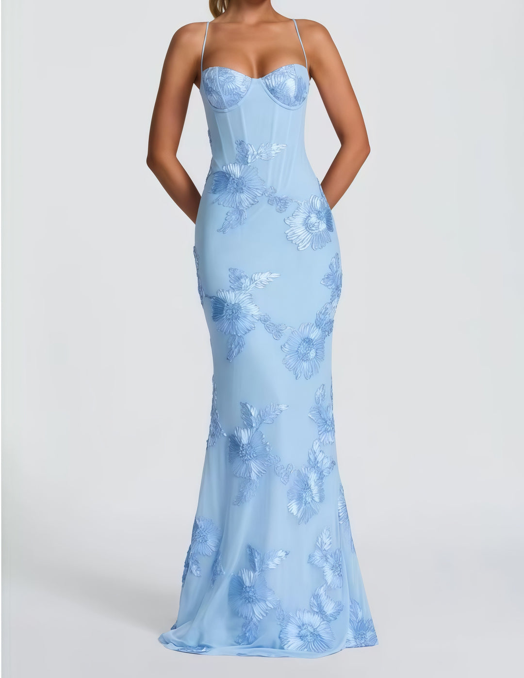 Woman wearing embroidered mermaid maxi dress