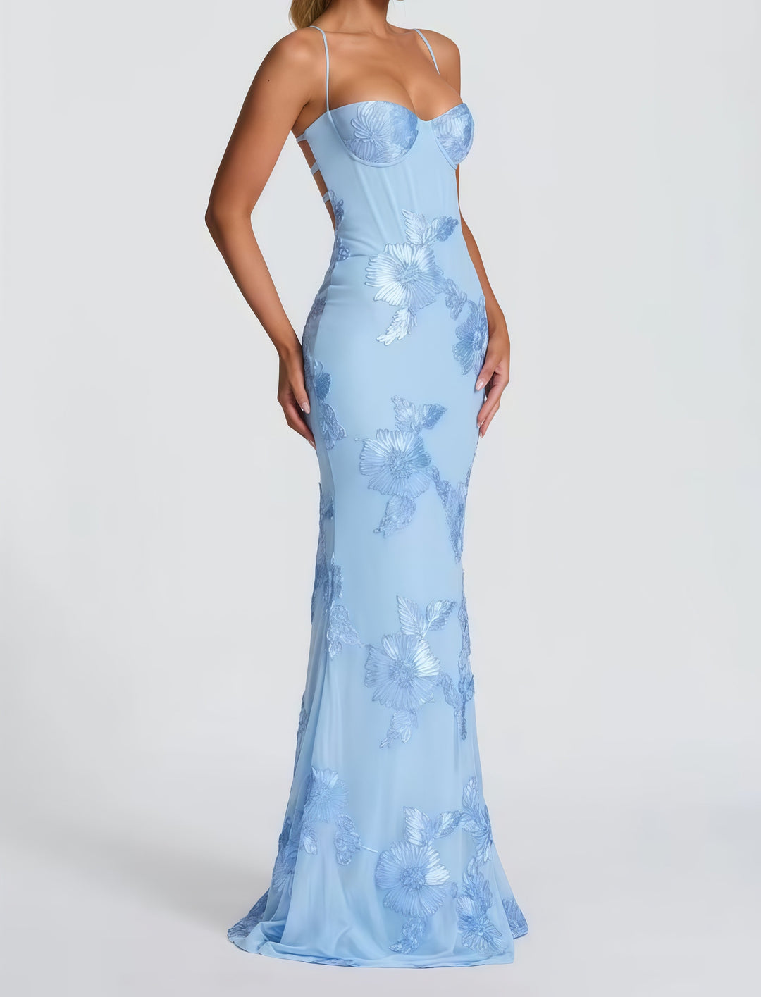 Woman wearing embroidered mermaid maxi dress