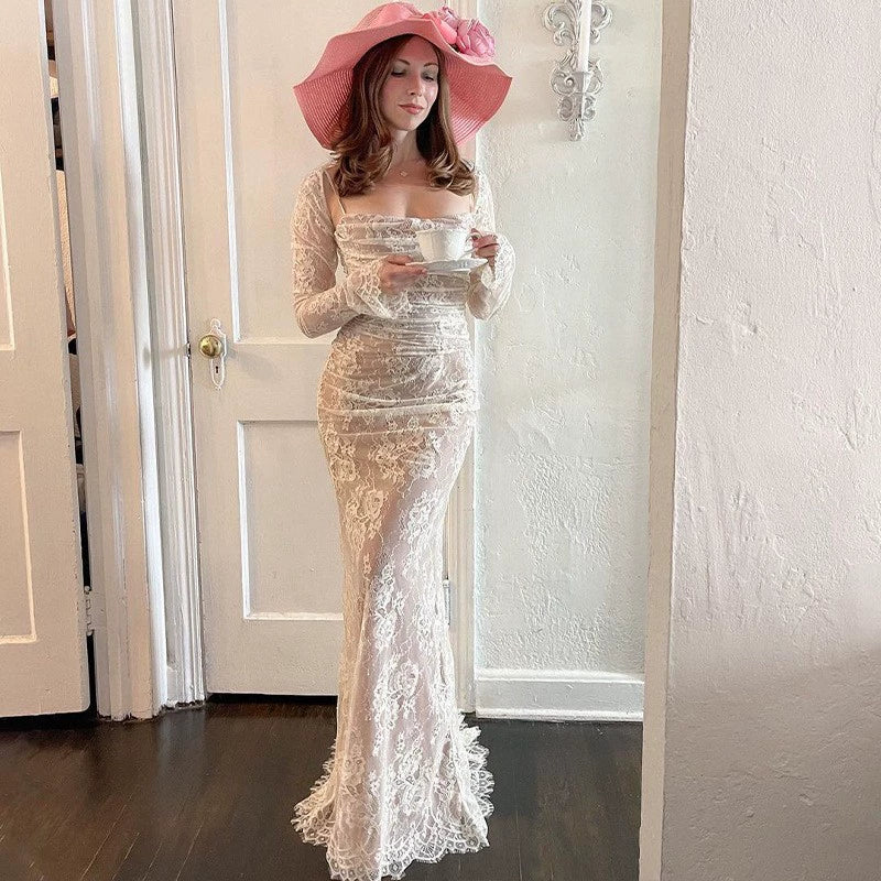 Woman wearing elegant lace maxi dress