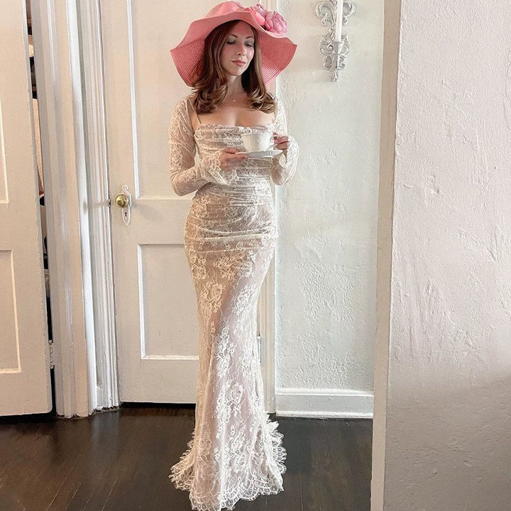 Woman wearing elegant lace maxi dress