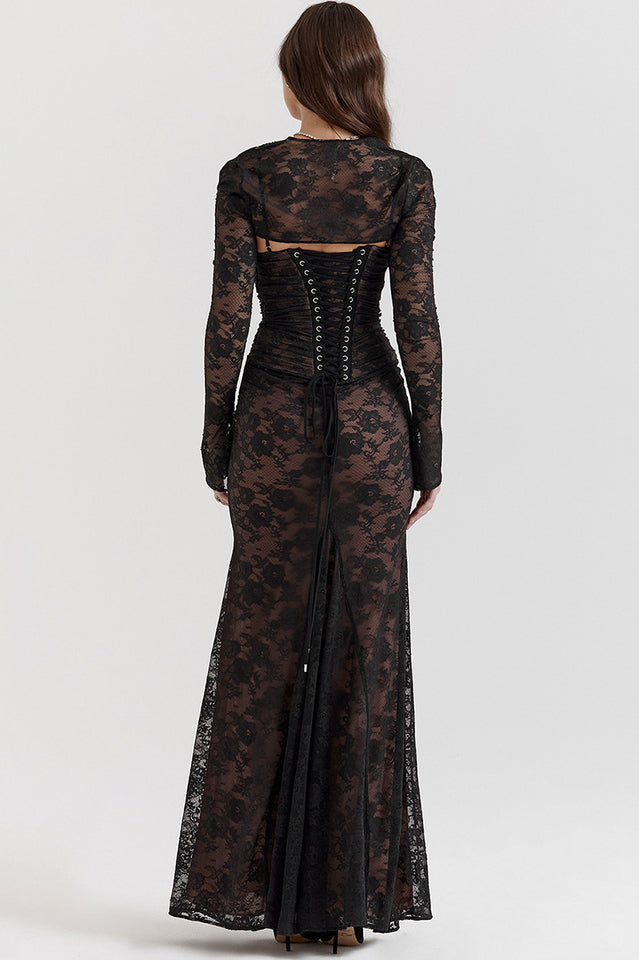 Woman wearing elegant lace maxi dress