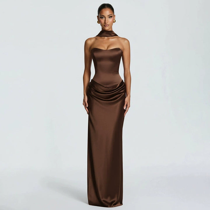 Woman wearing black satin corset maxi dress