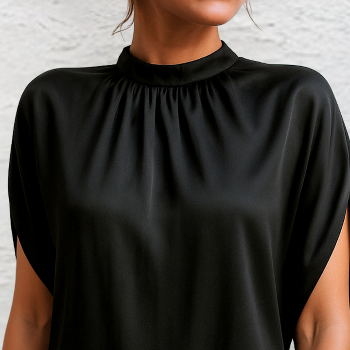 Woman wearing high-neck satin mini dress