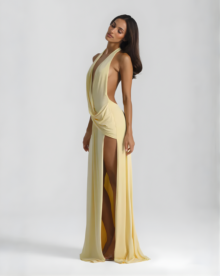 Woman wearing backless satin evening maxi dress