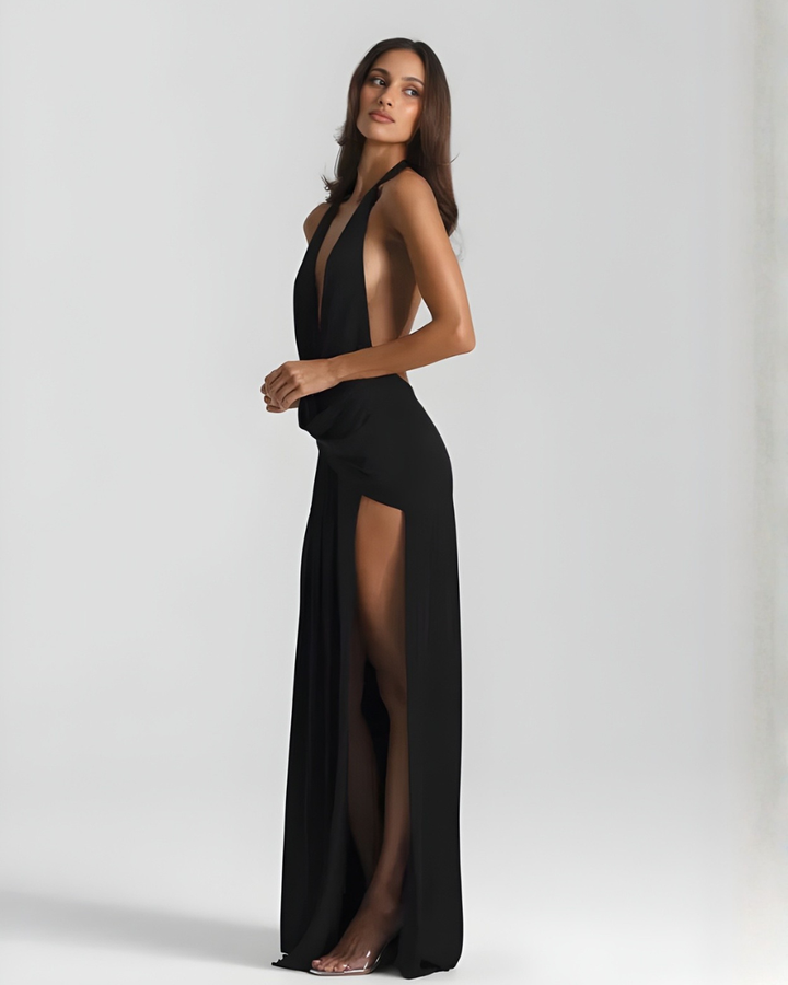 Woman wearing backless satin evening maxi dress