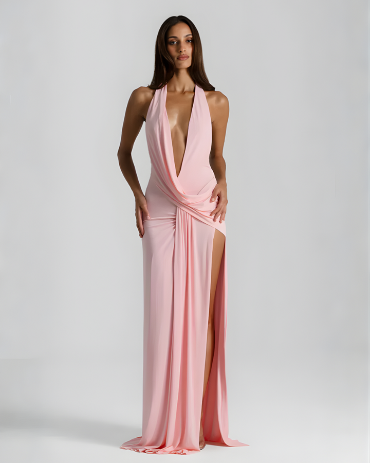 Woman wearing backless satin evening maxi dress