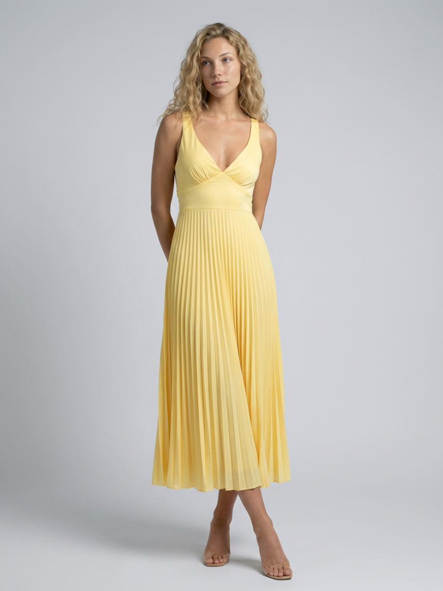Woman wearing pleated maxi dress