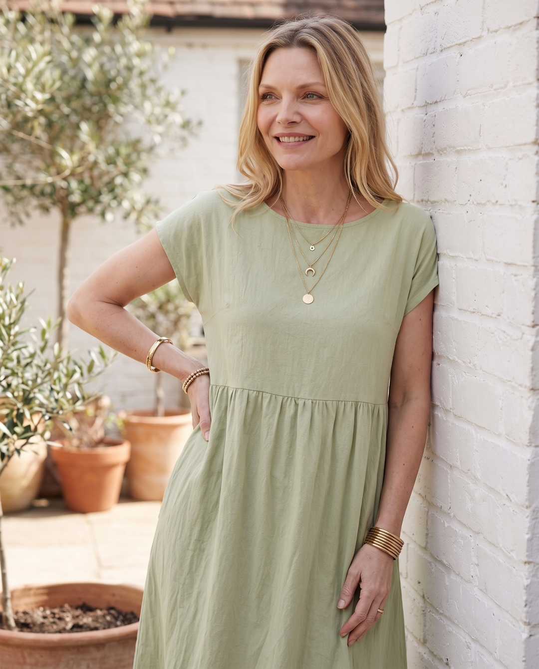Woman wearing effortless linen midi dress