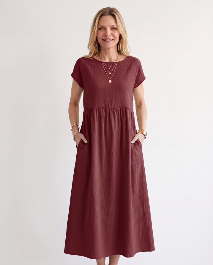 Woman wearing effortless linen midi dress