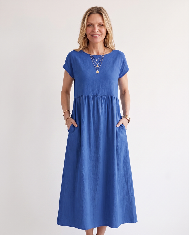 Woman wearing effortless linen midi dress