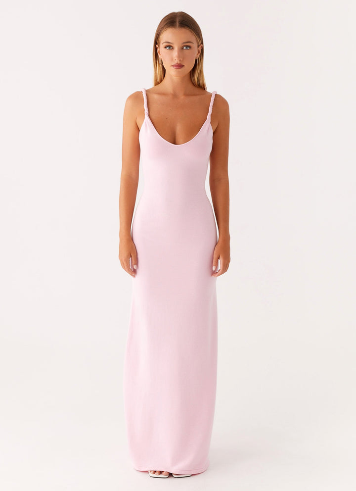Woman wearing soft blue maxi dress