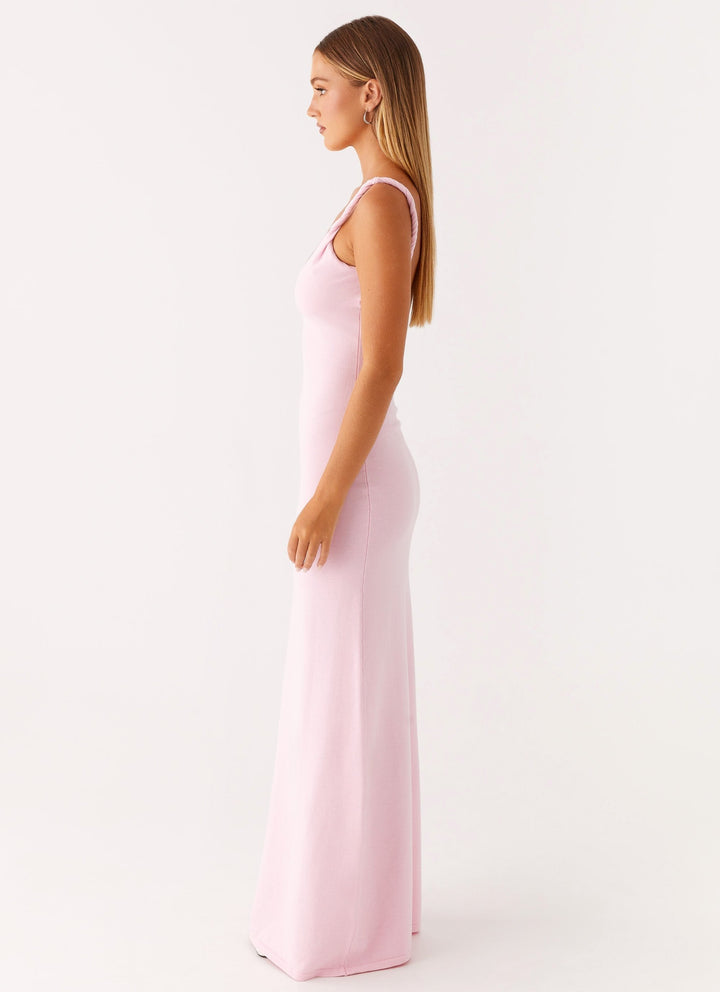 Woman wearing soft blue maxi dress