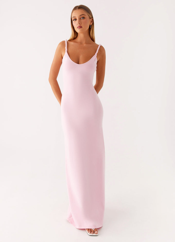 Woman wearing soft blue maxi dress