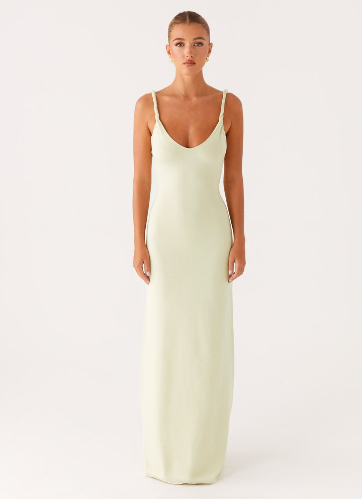 Woman wearing soft blue maxi dress