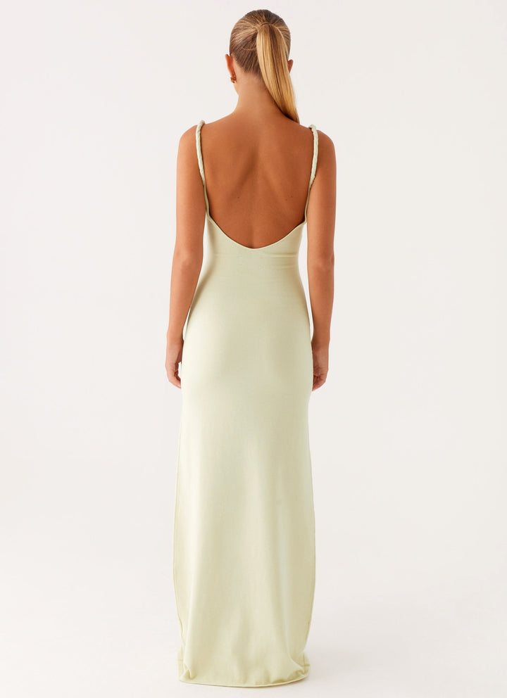 Woman wearing soft blue maxi dress
