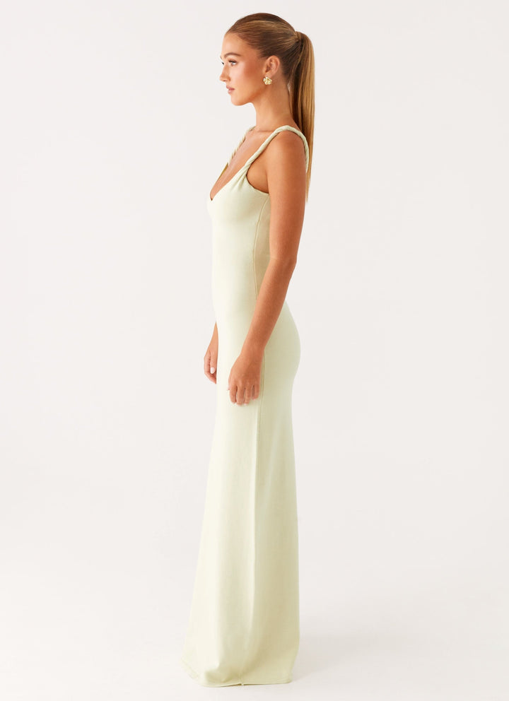 Woman wearing soft blue maxi dress