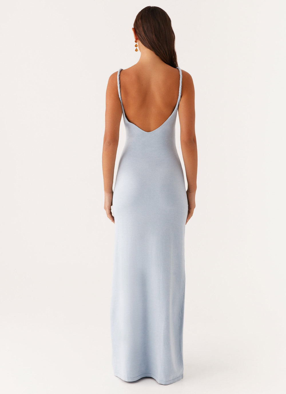 Woman wearing soft blue maxi dress
