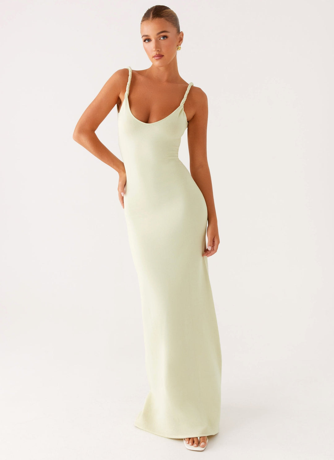 Woman wearing soft blue maxi dress
