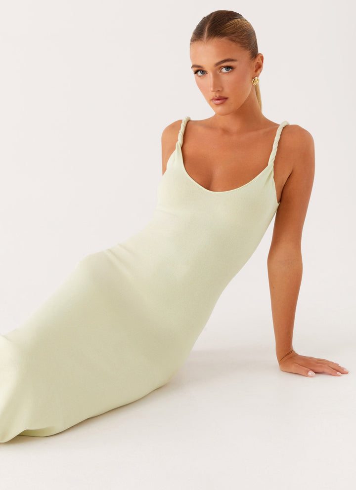 Woman wearing soft blue maxi dress