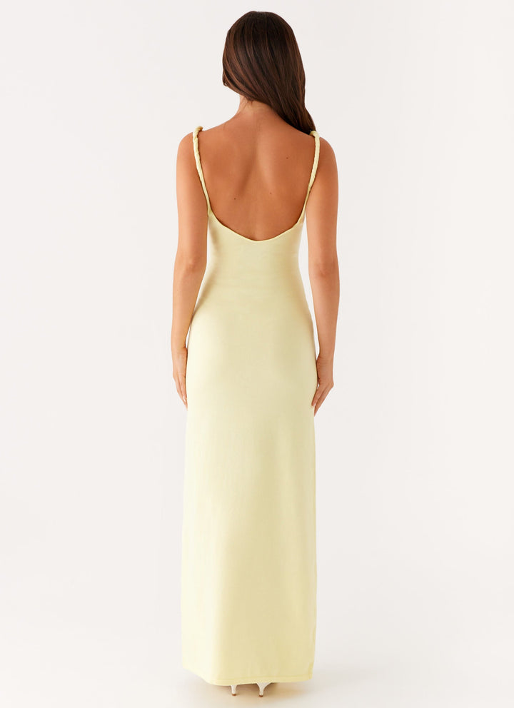 Woman wearing soft blue maxi dress