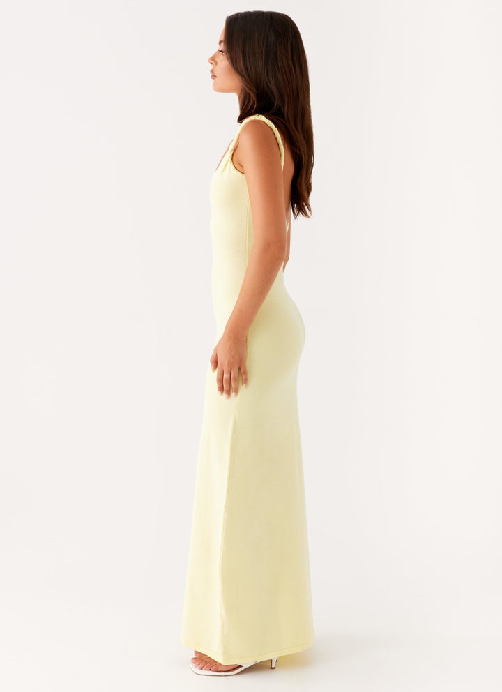 Woman wearing soft blue maxi dress