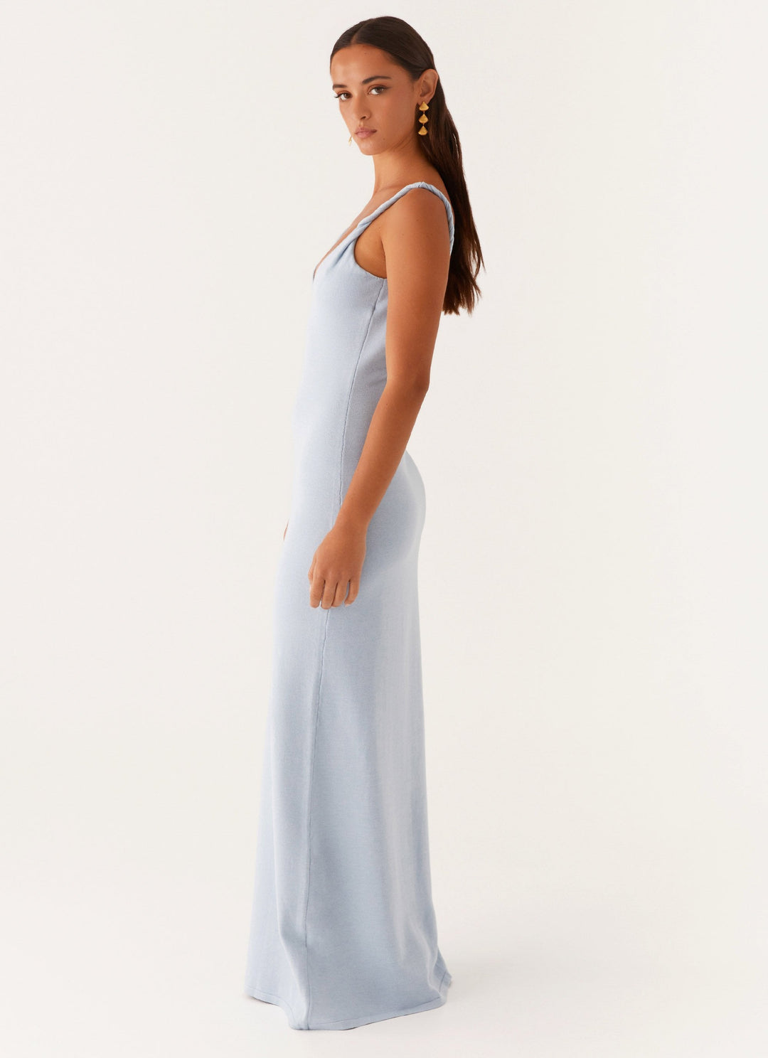 Woman wearing soft blue maxi dress