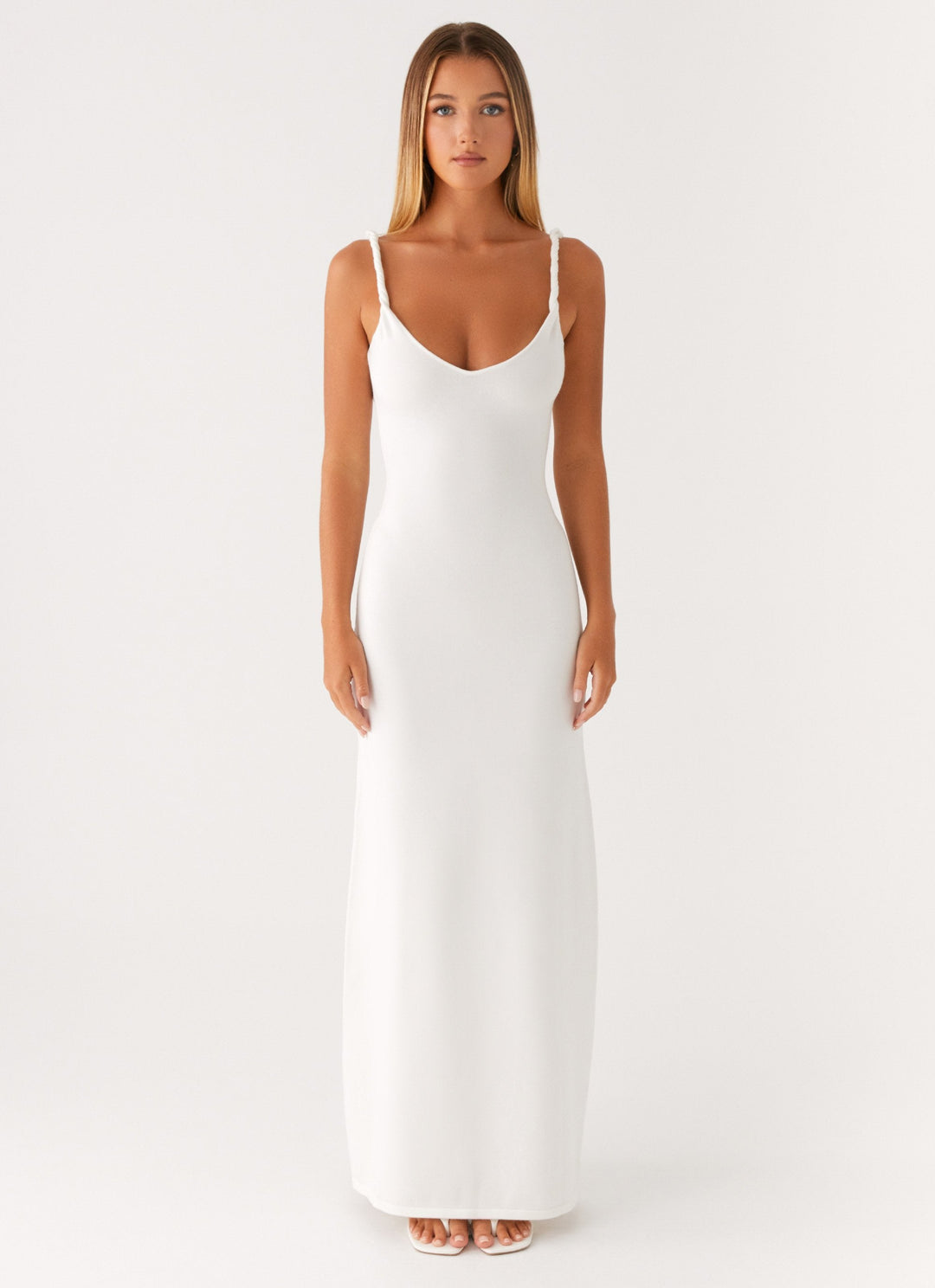 Woman wearing soft blue maxi dress