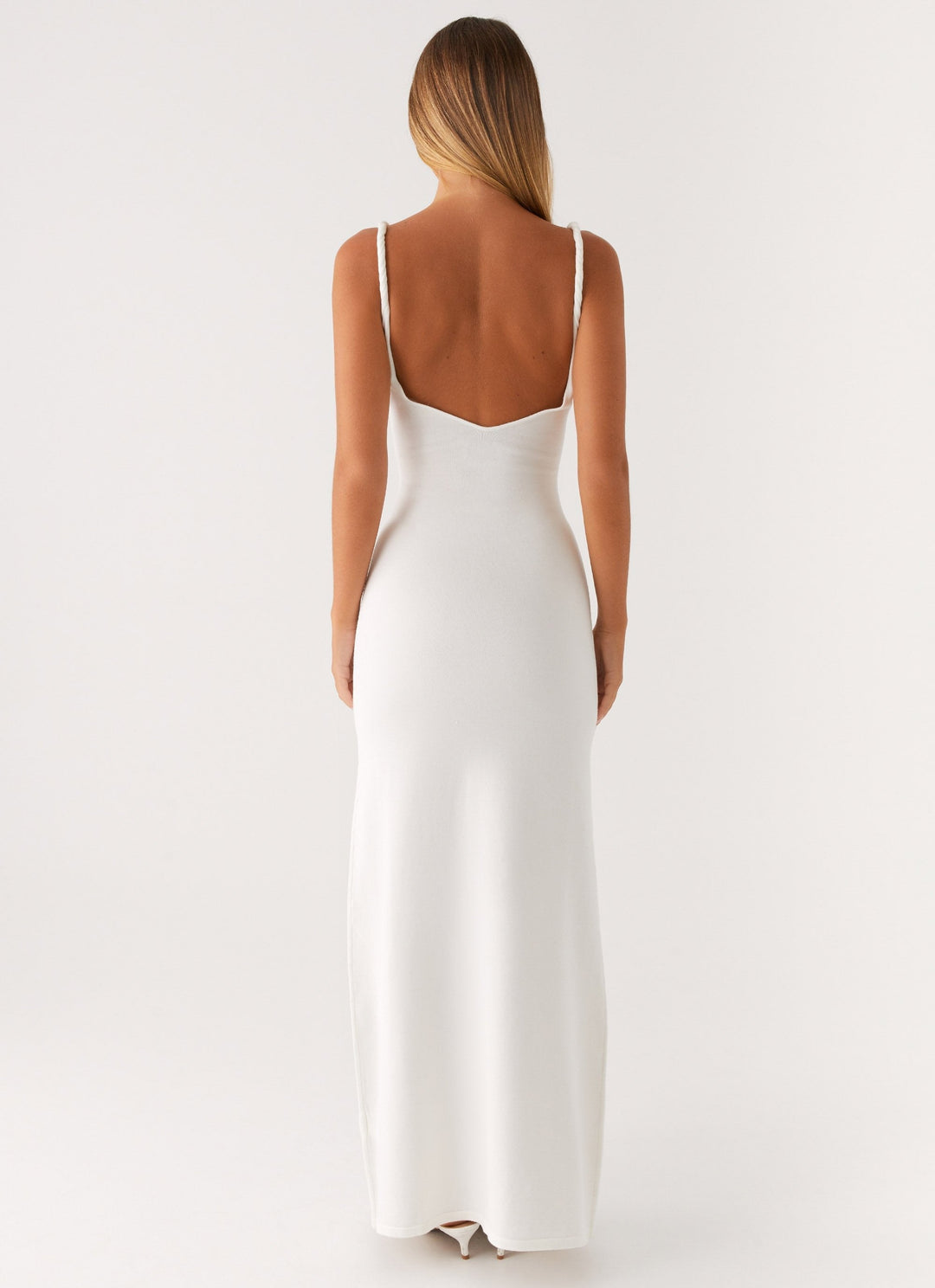 Woman wearing soft blue maxi dress