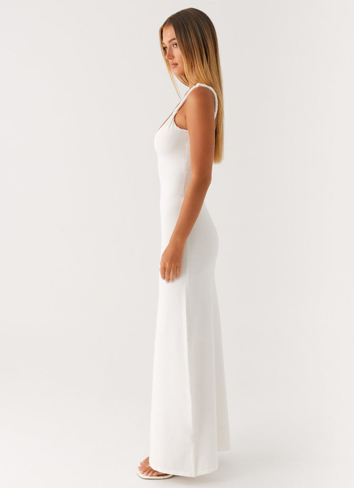 Woman wearing soft blue maxi dress