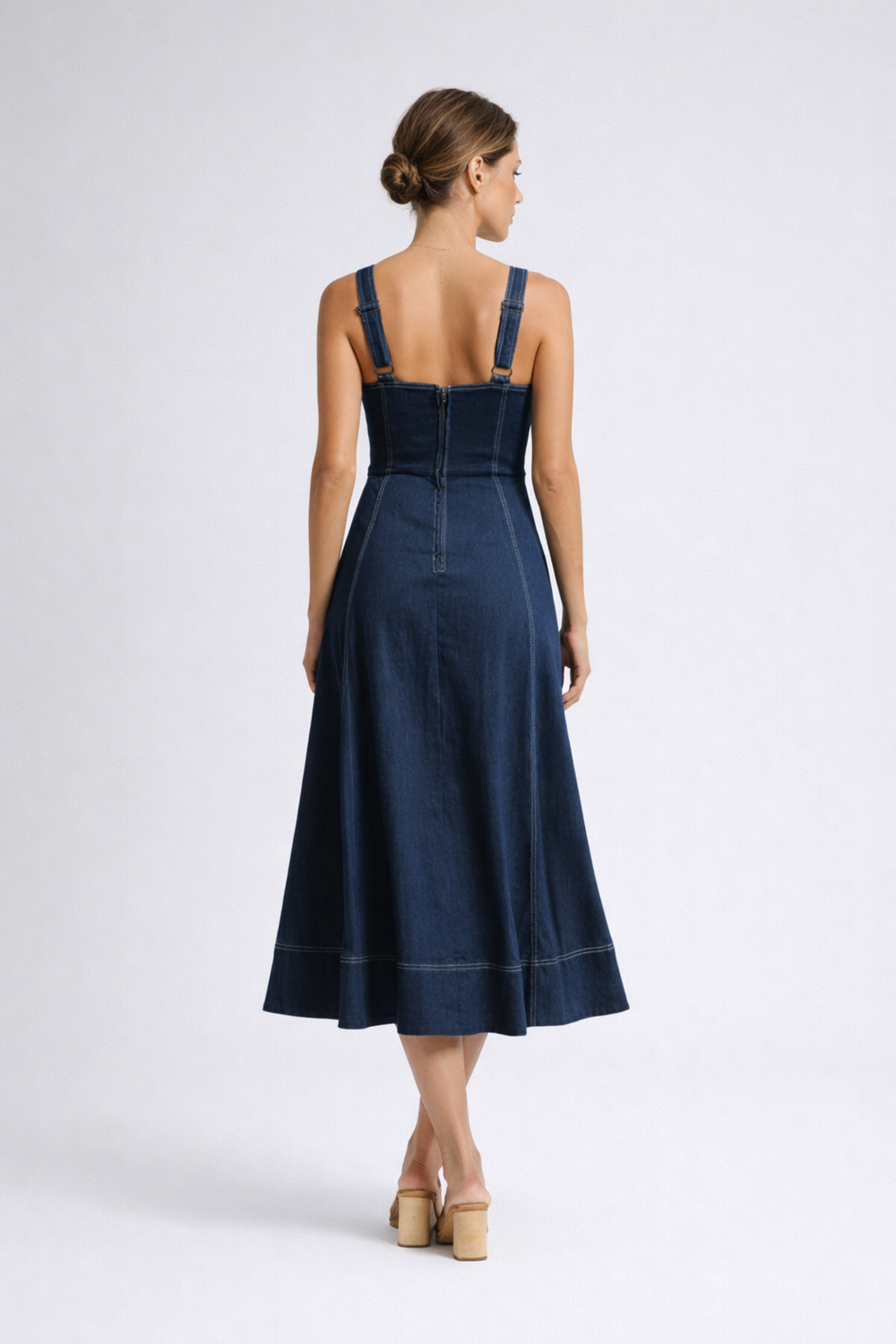 Woman wearing denim midi dress