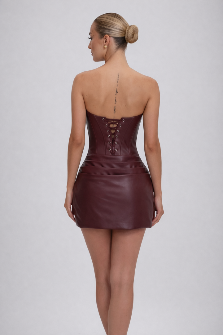 Woman wearing luxe corset mini dress