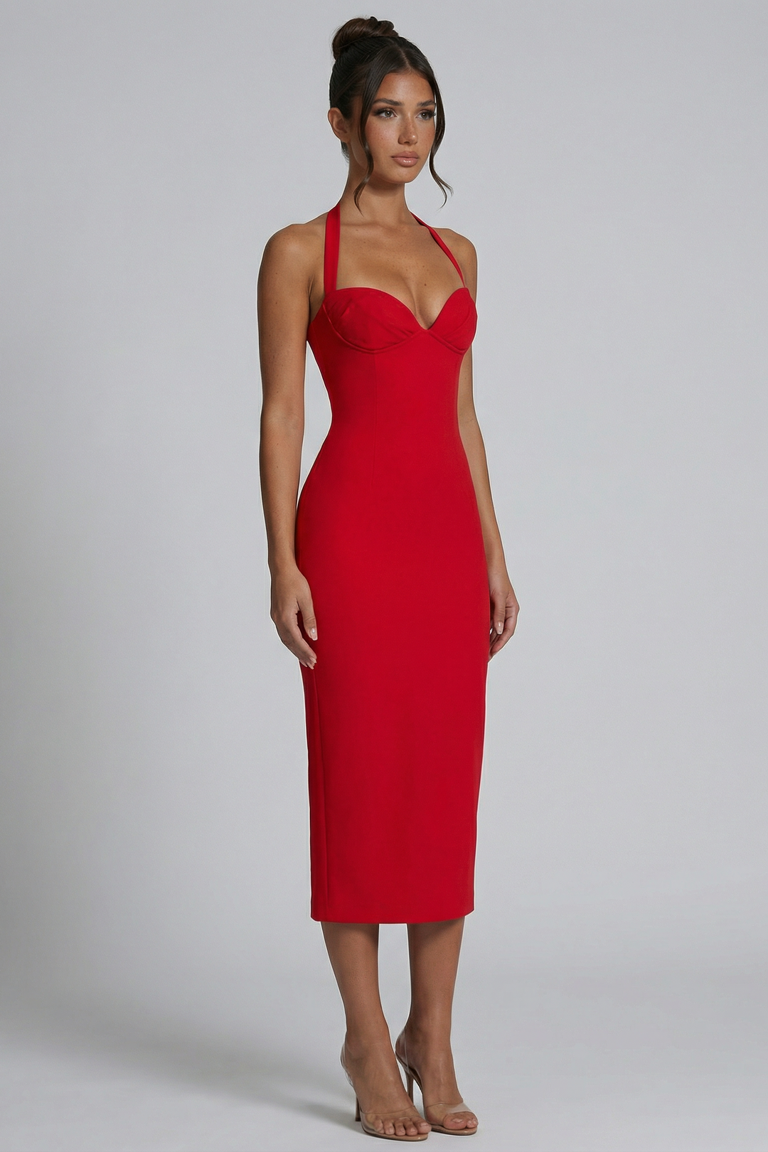 Woman wearing elegant halter midi dress