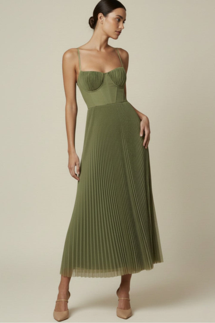 Woman wearing pleated midi dress