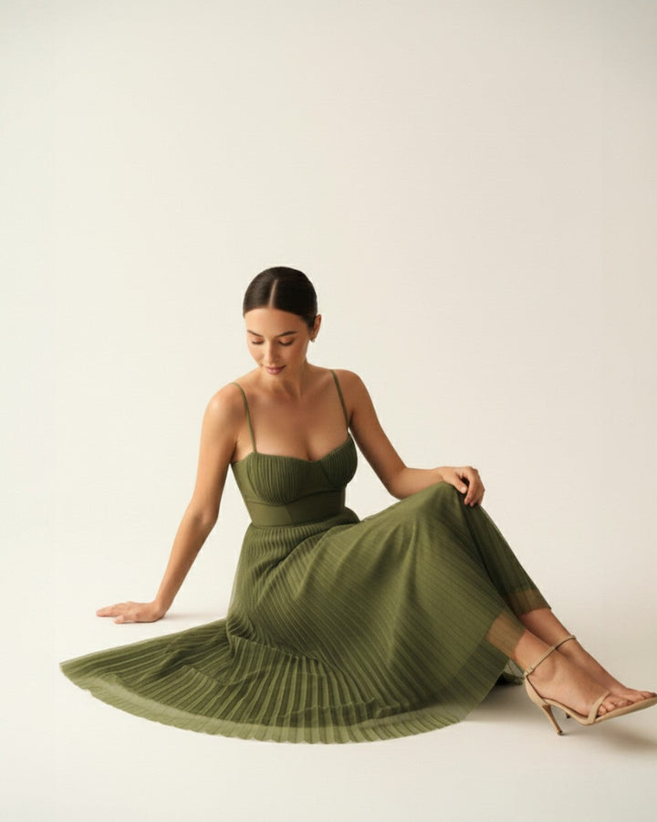 Woman wearing pleated midi dress
