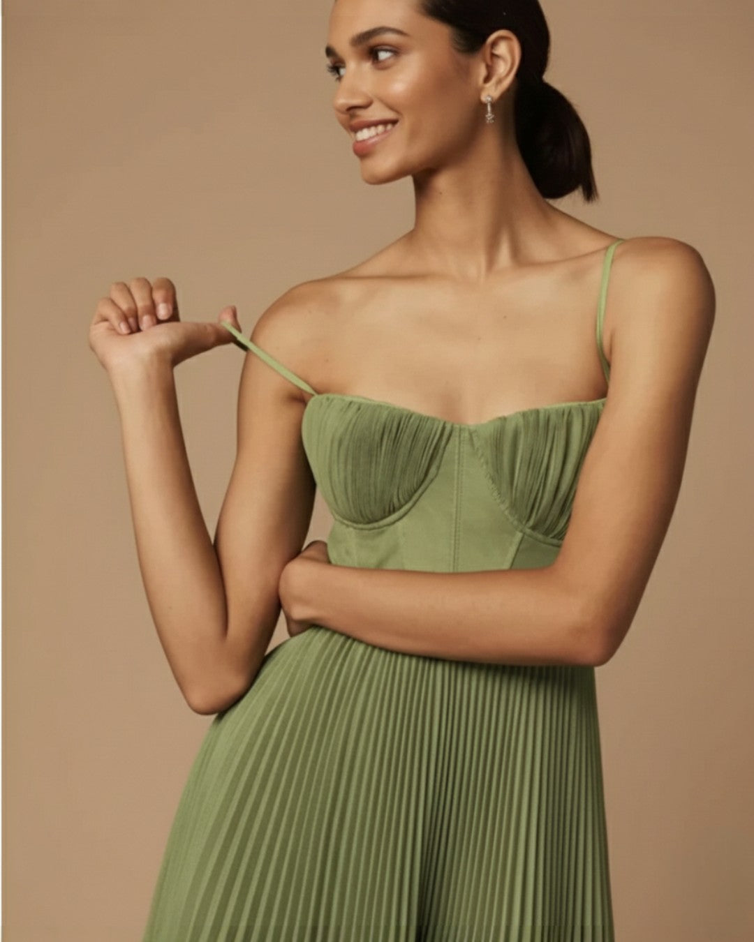 Woman wearing pleated midi dress
